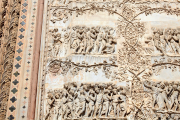 Orvieto (TR), Italy - May 10, 2016: A particular of Orvieto cathedral facade, Terni, Umbria, Italy