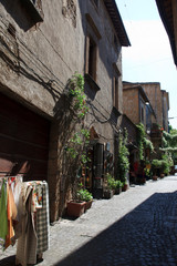 Orvieto (TR), Italy - May 10, 2016: A typical road and houses in centre of Orvieto, Terni, Umbria,...
