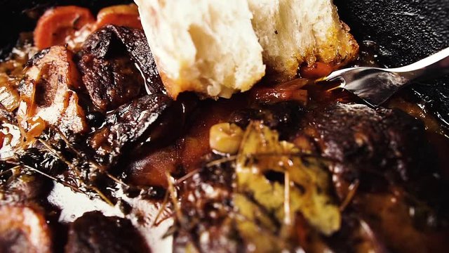 Delicious ossobuco in a pan. Traditional Italian food.