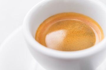 Espresso coffee in a white ceramic cup