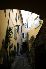 Cervo (IM), Italy - December 30, 2017: A tipycal road and houses in Cervo village, Italian Riviera,...