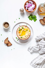 Chickpeas hummus with toasted bread, olive oil and paprika