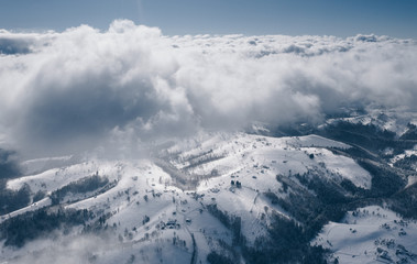 Above the clouds a typical Romania winter landscape