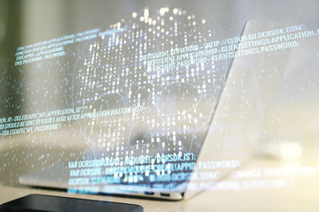 Creative concept of code skull illustration on modern laptop background. Hacking and phishing concept. Multiexposure