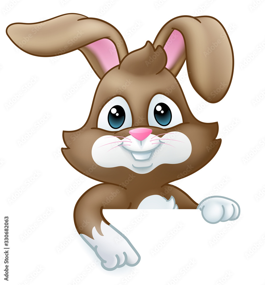 Wall mural easter bunny rabbit cartoon character peeking over a sign background and pointing down at it