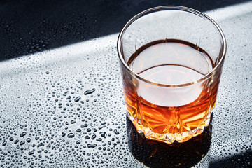 whiskey on a cold and wet surface