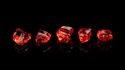 Closeup of red gems stone garnet isolated