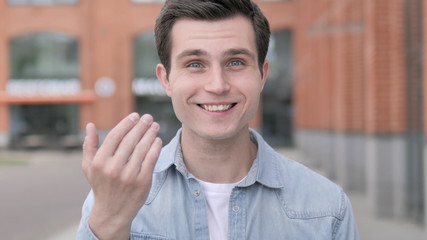 Outdoor Young Man Inviting People
