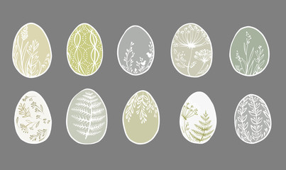 Set of cute decorated Easter eggs isolated on gray background. Collection of symbols of religious holiday covered with different floral patterns. Holiday flat illustration