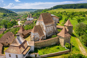 Fototapeta na wymiar Aerial view of the traditional Saxon Church in Roades village, Transylvania, Romania