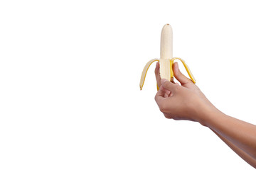 Fototapeta na wymiar Hand holding banana isolated on white background