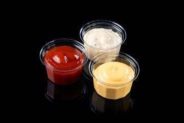 Containers with mayonnaise mustard and ketchup