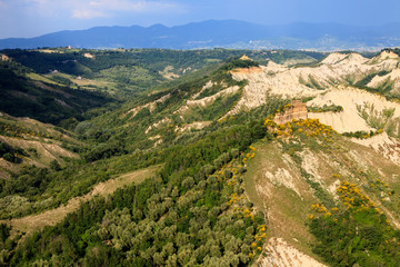 Civita di Bagnoregio (VT), Italy - May 15, 2016: Soft eroded clay landscape around Civita di...