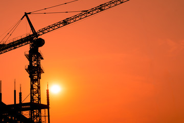 tower crane with sunset background