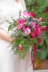 wedding purple boho bouquet in bride's hands