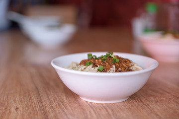 The cooking process of Chinese traditional snacks, noodles served with soy sauce and pansit