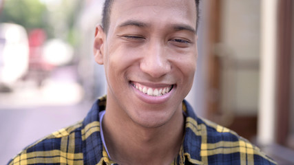 The Close up of Smiling Young African Man, Outdoor