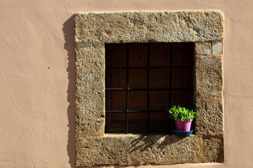 Norcia (PG), Italy - May 25, 2015: Typical stone window in Norcia, Umbria, Italy, Europe