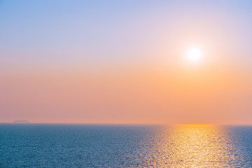Beautiful sunset or sunrise around sea ocean bay with cloud on sky