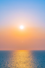 Naklejka na ściany i meble Beautiful sunset or sunrise around sea ocean bay with cloud on sky