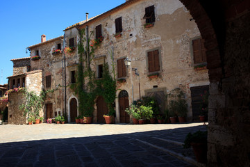 Fototapeta premium Montemerano (GR), Italy - September 11, 2017: The square in Montemerano village, Manciano, Grosseto, Tuscany, Italy, Europe
