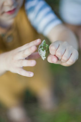 White flower in the childs hands