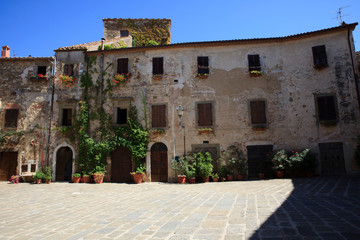 Montemerano (GR), Italy - September 11, 2017: A typical house and square in Montemerano village, Manciano, Grosseto, Tuscany, Italy, Europe