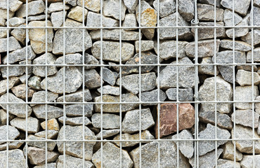 wall of stones placed behind the grid