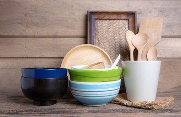 Rustic kitchenware against white wooden wall