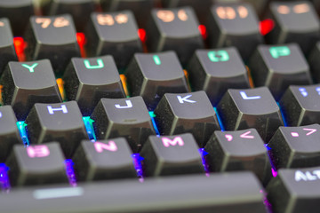 Photo of isolated dusty mechanical computer keyboard.