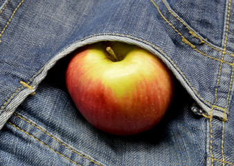 apple in jeans pocket