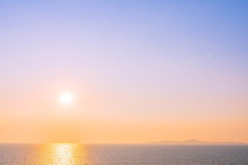 Beautiful sunset or sunrise around sea ocean bay with cloud on sky