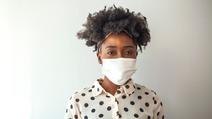 Stop the virus and epidemic diseases. Healthy woman in blue medical protective mask. Health protection and prevention during flu and infectious outbreak.