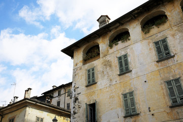 Fototapeta na wymiar Orta San Giulio (NO), Italy - September 02, 2019: Typical house facade detail in Orta, Orta, Novara, Piedmont, Italy