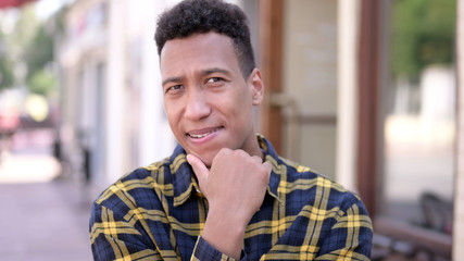 Obraz premium The Outdoor Young African Man Thinking New Idea