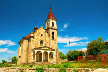 Fototapeta na wymiar Neo Gothic Roman Catholic Church in Baikivtsi, Ternopil suburban area, Ukraine
