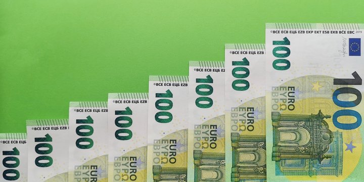 New Euro banknotes issued in 2019 with face value of one hundred,laid out in the form of stairs going up on green backdrop,reflecting the trend of increasing the exchange rate.Growth of the currency