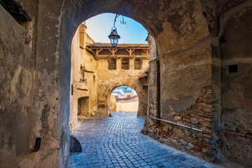 Arched entryway into old fortress, Sighisoara, Romania. UNESCO World Heritage Site