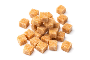 brown refined sugar on a white background