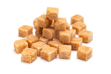 brown refined sugar on a white background