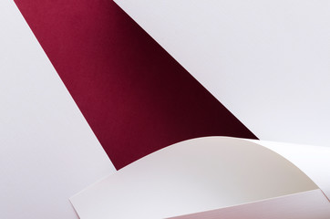 Two colors,white and red paper as a backdrop.Empty space for design