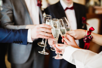 Gorgeous wedding couple enjoys champagne in the ceremony