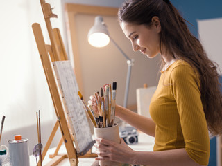 Painter choosing the right brush