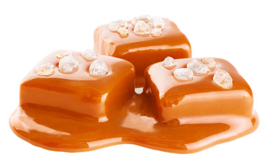 Salted caramel pieces isolated on white background.
