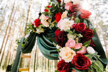 organization of a wedding ceremony in the forest in summer on a sunny day
