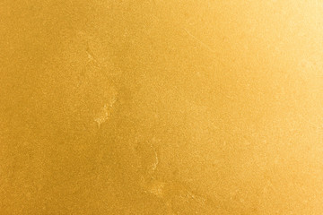 Gold painted metal texture for background.