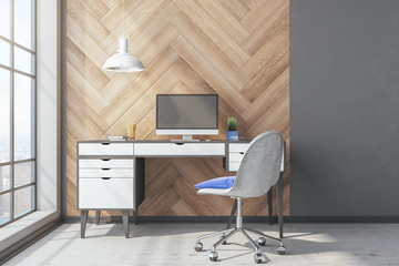 Modern designer desktop with empty computer screen