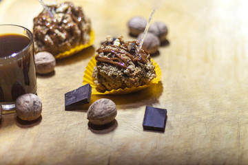 Tasty pastry cakes on background