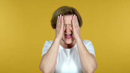 The Old Woman Gesturing Failure and Problems Isolated on Yellow Background