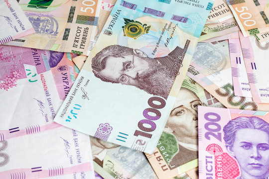 Ukrainian money hryvnia closeup many pieces are